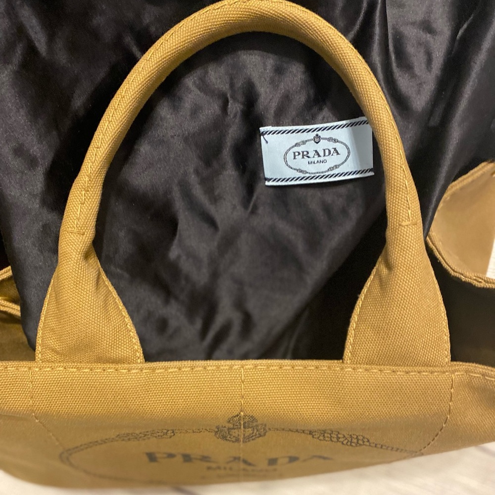 Prada linen shopping bag 13X8x. Good condition. Very clean  Tan.  Side pockets - Picture 7 of 16